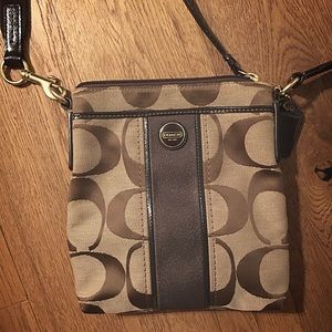 COACH brown/tan crossbody bag.